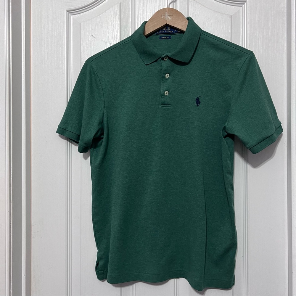 Polo Ralph Lauren Size small. Has some thread pulls on each side of shoulder